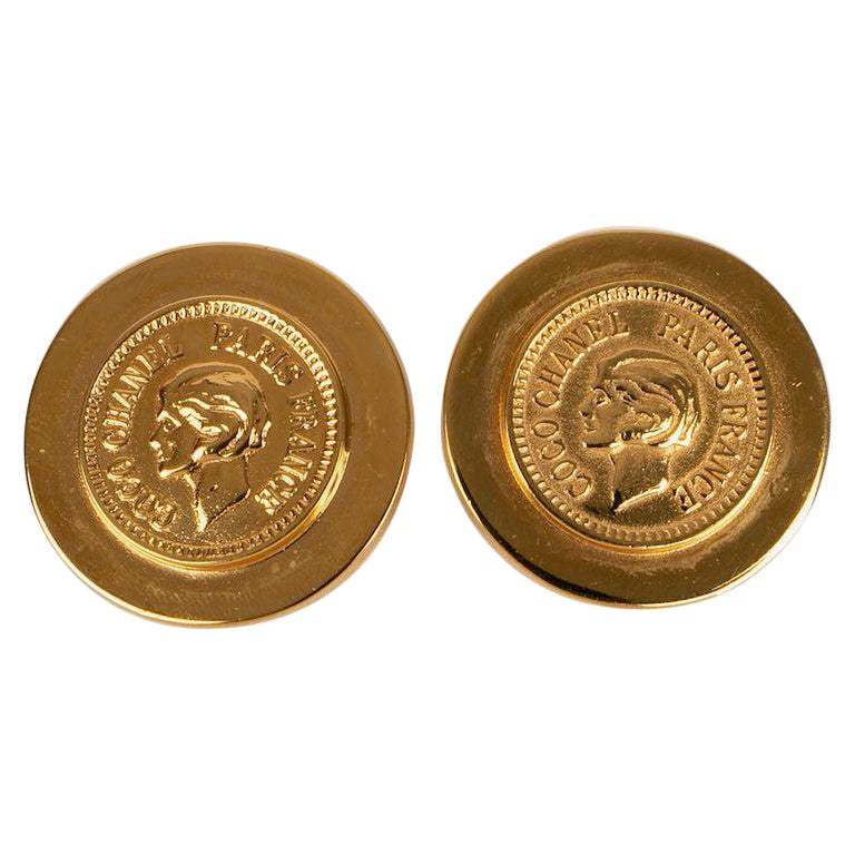 Boucles d'oreilles "Coco" de Chanel en métal doré