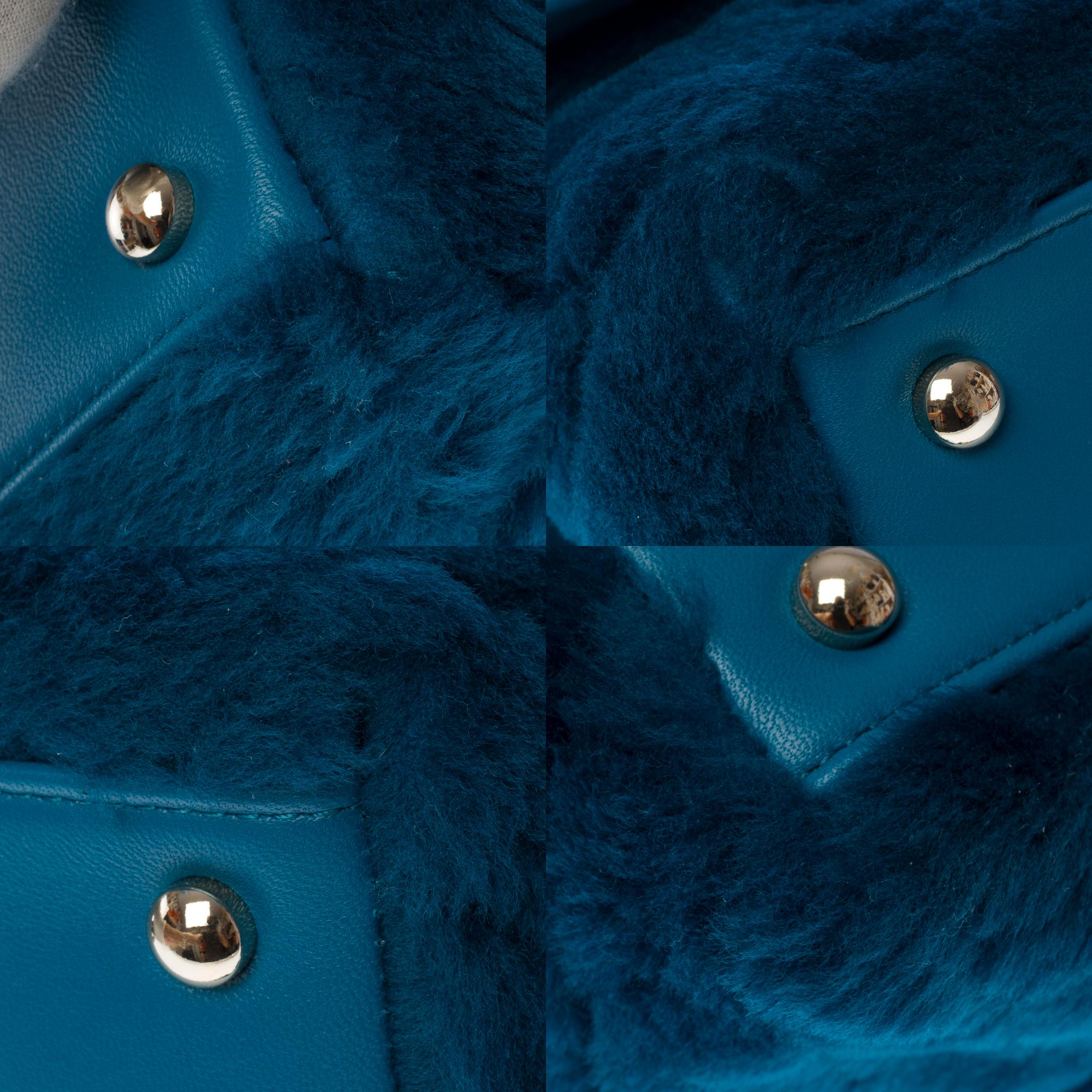 Sac à main Chanel Coco en peau de mouton matelassée à chevrons bleu pétrole 9