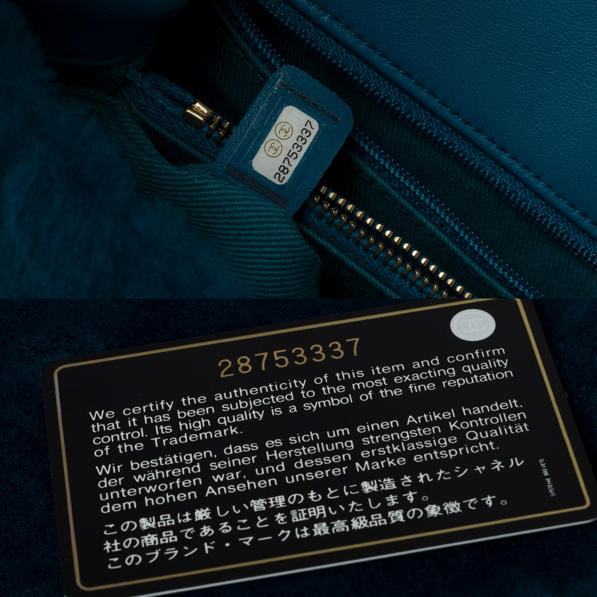Sac à main Chanel Coco en peau de mouton matelassée à chevrons bleu pétrole 4