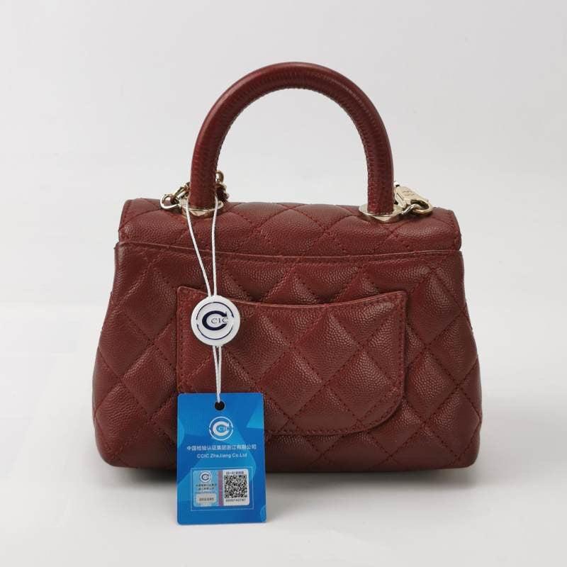 Chanel Coco Handle Mini Burgundy Caviar Leather Crossbody Bag In Excellent Condition In AUBERVILLIERS, FR
