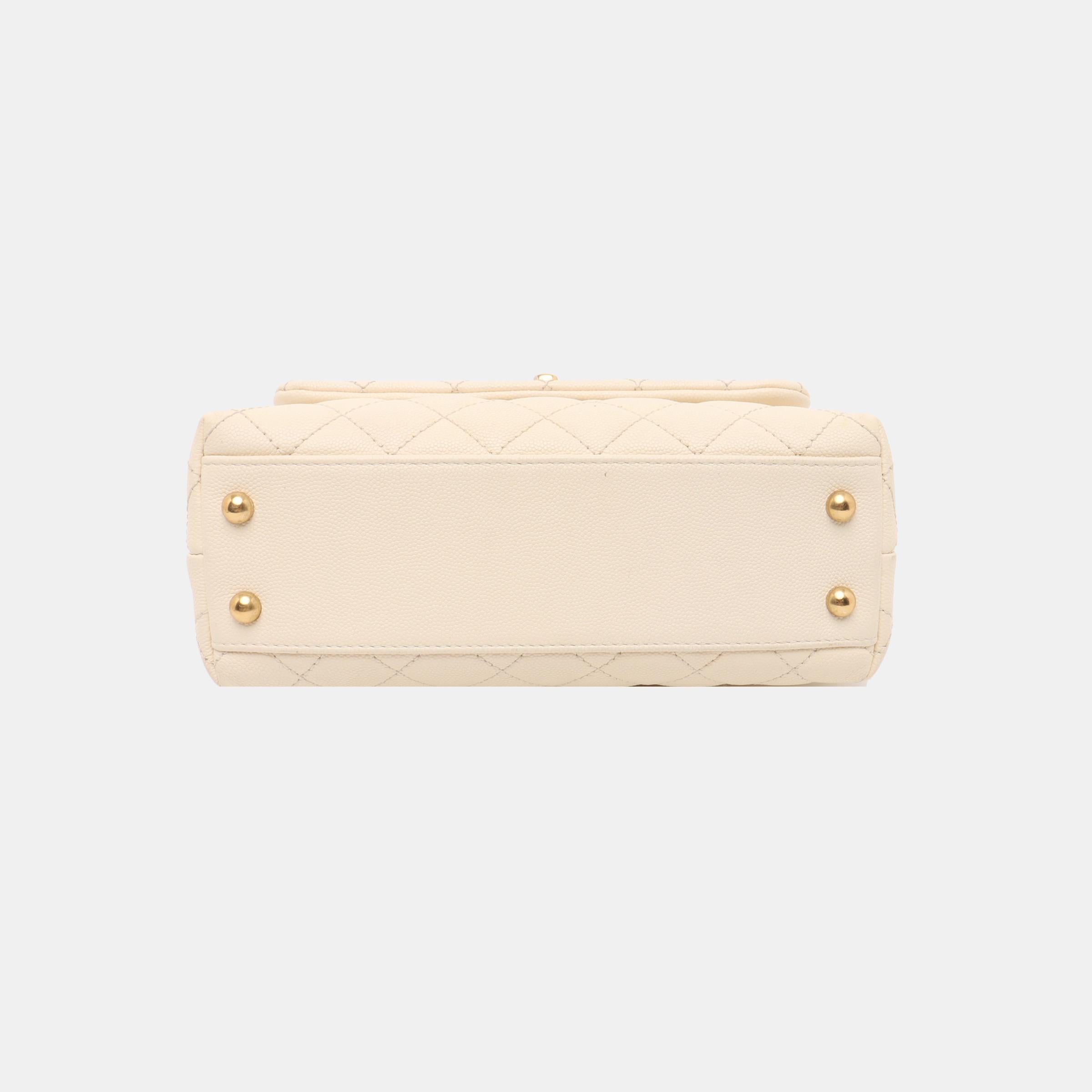 Chanel Coco Handle Small Beige Caviar Leather Gold Hardware, 2017
 These are professional photos of the actual bag.
 CONDITION: VERY GOOD
 This preloved / preowned Chanel coco handle is in very good condition. Light rubbing around the corners,