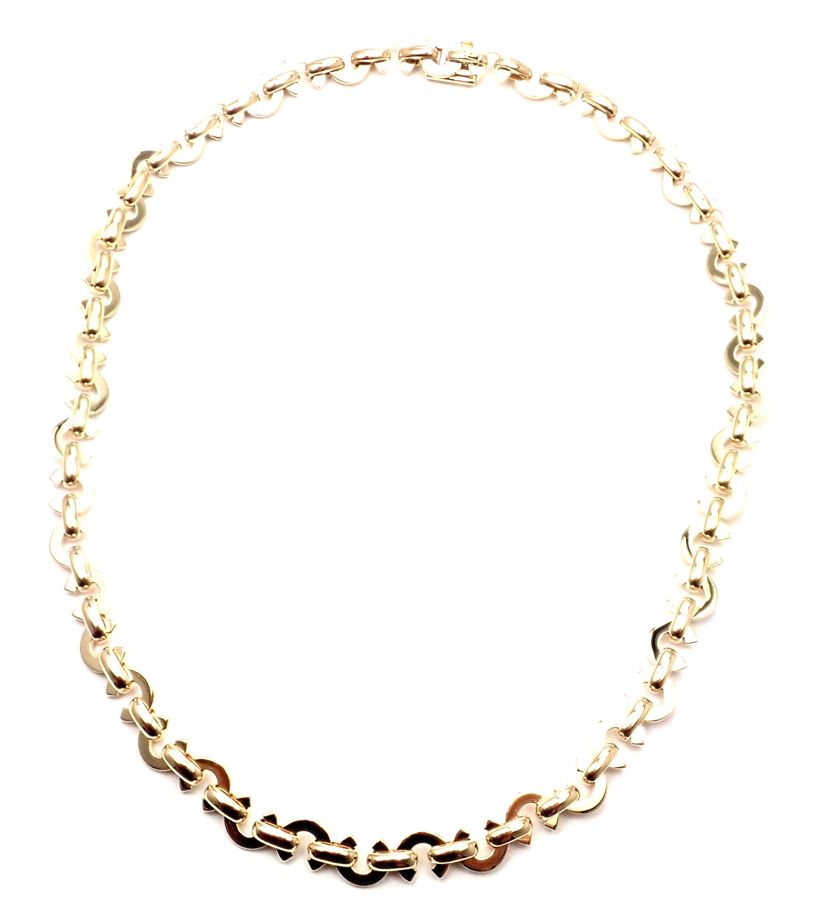18k Yellow Gold Coco Logo Link Chain Necklace by Chanel
Details: 
Length:  15.5