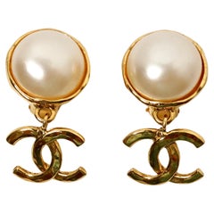 Chanel Coco Mark Gold Plated Costume Pearl CC Dangle Earrings circa 1993