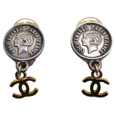 Chanel Coco Medallion Interlocking CC Drop Clip-On Earrings circa 1996
