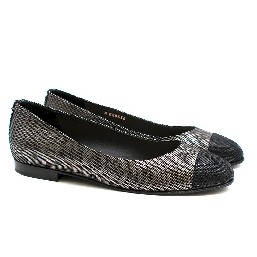 Chanel Coco Pewter & Black Flat Pumps 

- Silver black & pewter fabric and leather ballet pumps.
-  Accented with the Chanel's  signature logo at heel.
- Almond double rolled toe. 
-Leather outer and insole 

Please note, these items are pre-owned