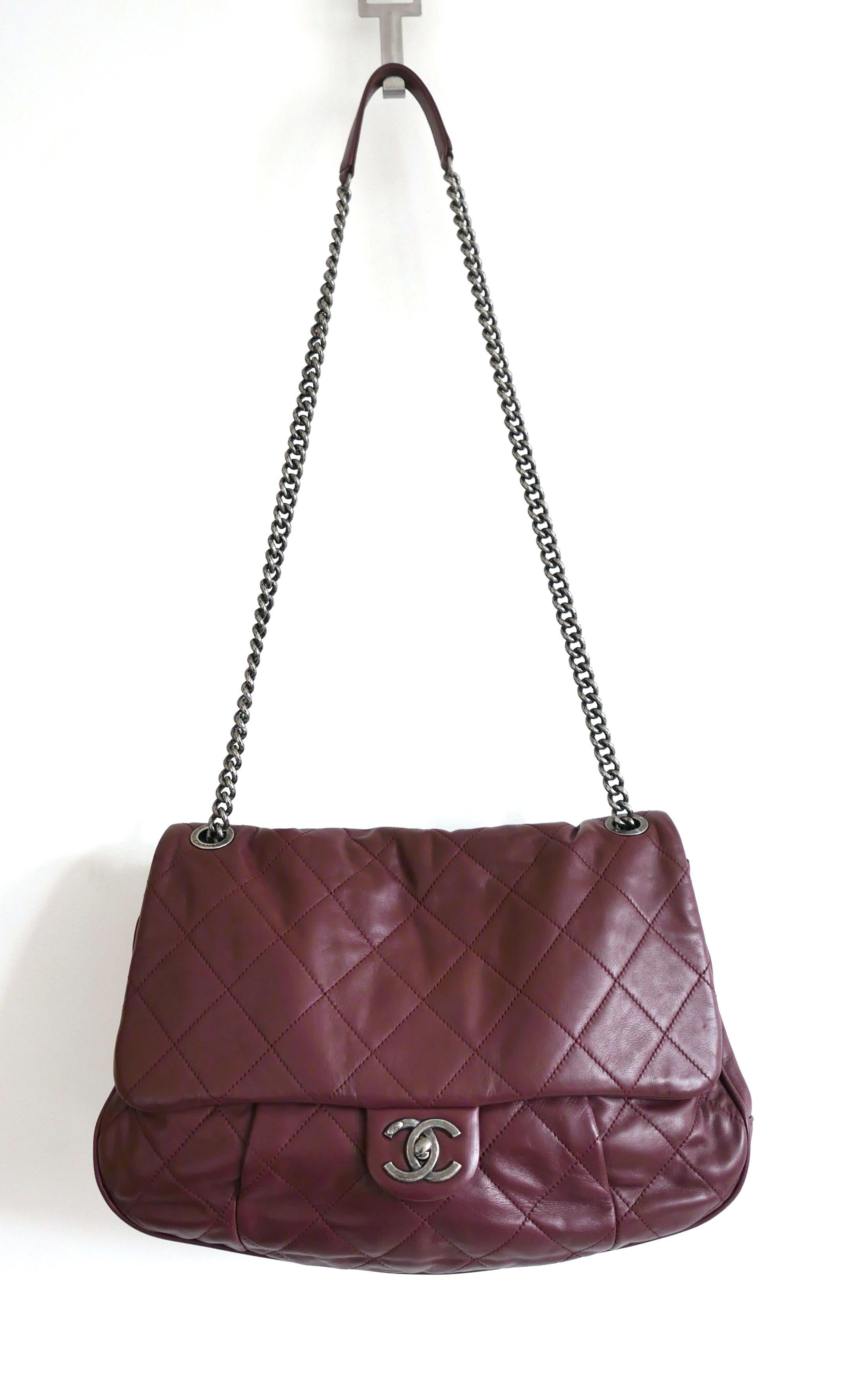 Stunning Chanel Coco Pleats Flap Bag - used a couple of times and comes with dustbag. Crafted from soft burgundy quilted calfskin leather, fit has a lovely, squishy and super roomy shape with pleated front detail, dual chain link strap with leather