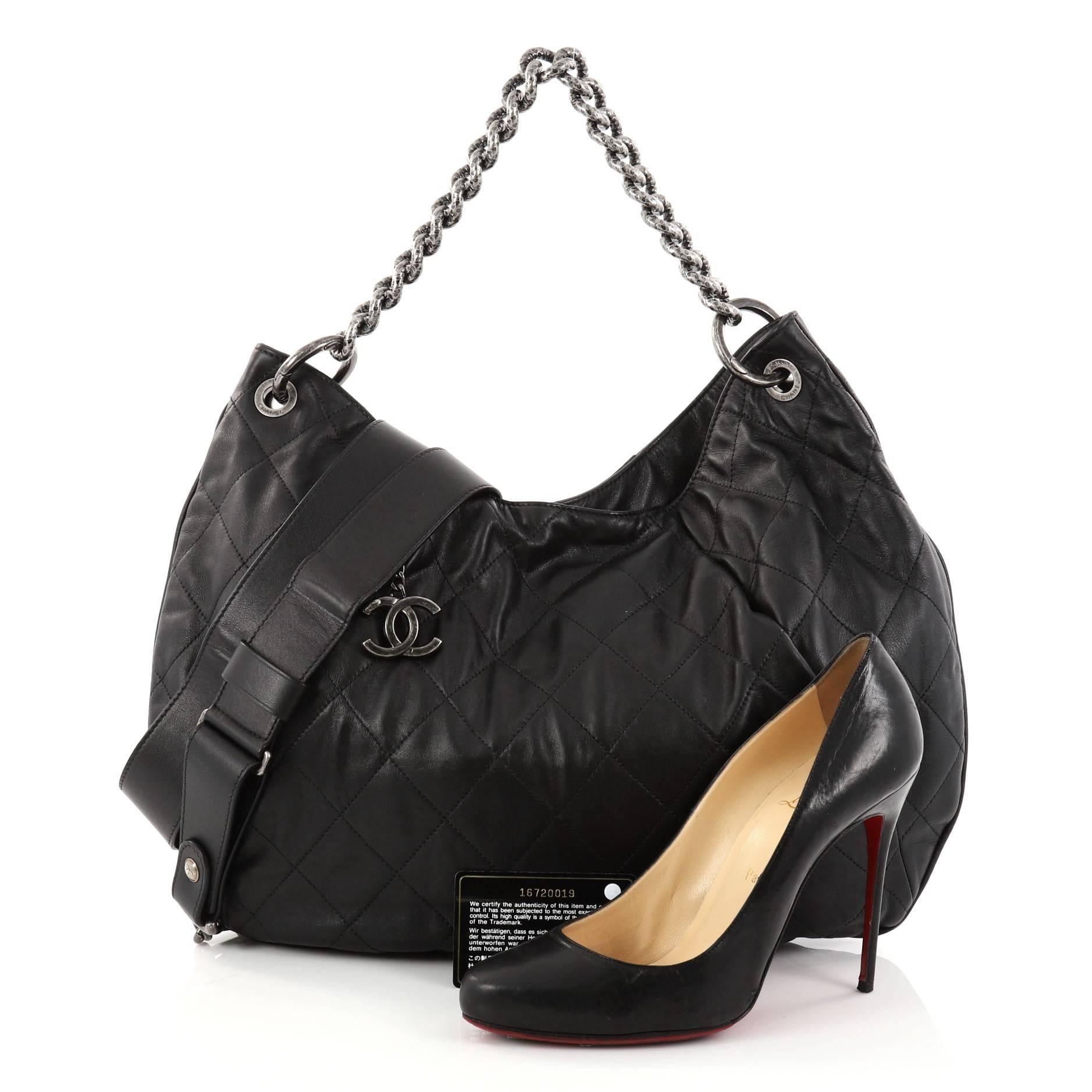 This authentic Chanel Coco Pleats Hobo Quilted Calfskin Large is designed for modern-day fashionistas. Crafted in black diamond quilted calfskin leather with detailed pleats, this chic hobo bag features stylized chain strap, exterior zip pocket and