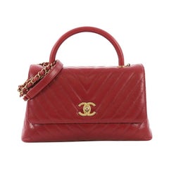 Chanel Coco Top Handle Bag Chevron aus Kalbsleder Klein
