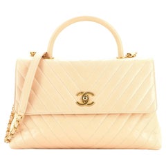 Chanel Coco Top Handle Bag Chevron Caviar Medium