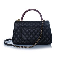 Chanel, coco top handle bag in black caviar leather