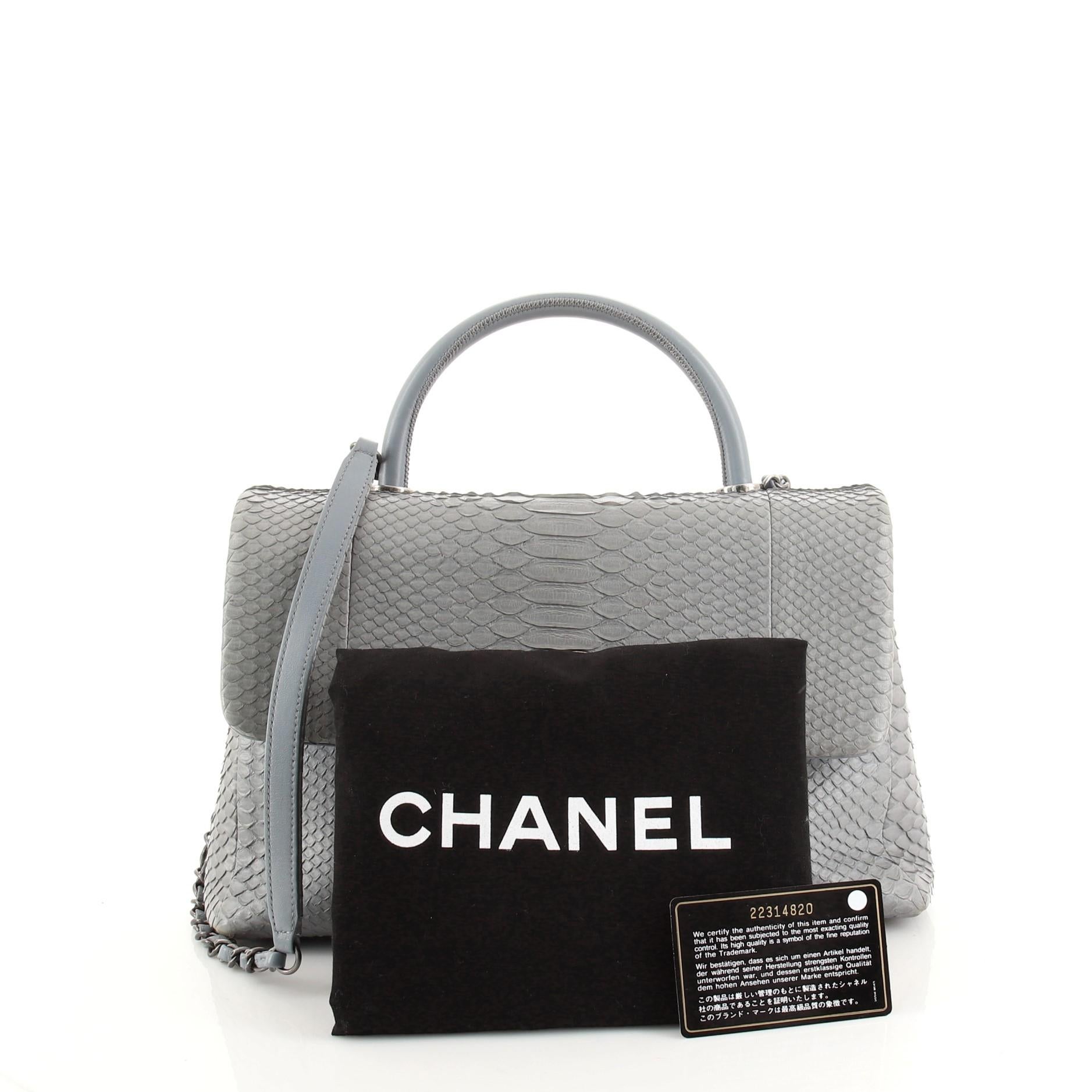 This item can only be shipped within the United States.

Condition: Outlet. Odor in interior. Creasing, heavy discoloration and lifting of scales on exterior and shoulder pad, small marks on front flap edge. Indentations underneath flap, scratches