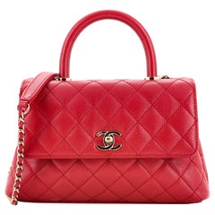 Sac à poignée Chanel Coco Mini matelassé caviar