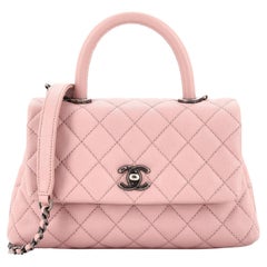 Sac à poignée Chanel Coco Mini matelassé caviar