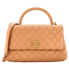 Sac à main Chanel Coco matelassé caviar avec poignée en chaîne, petit modèle