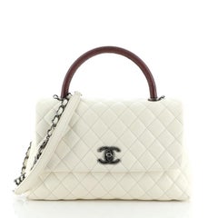 Chanel Coco Top Handle Bag Caviar matelassé avec cuir embossé lézard