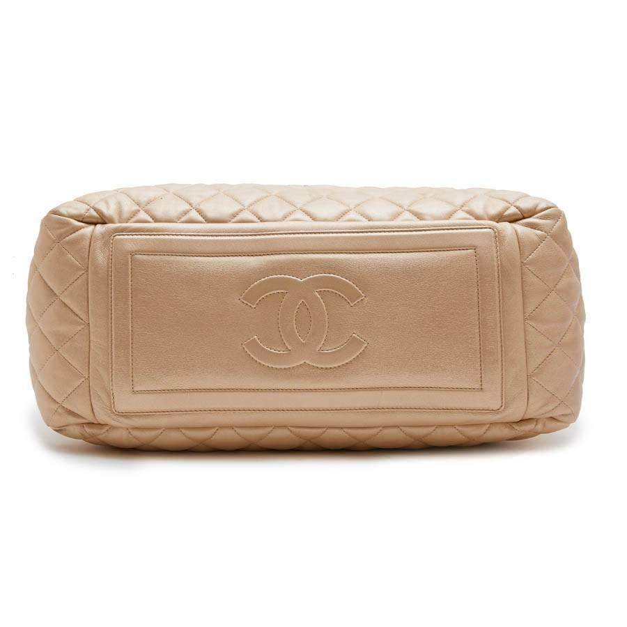 Brown CHANEL 'Cocoon' Bag in Gold Quilted Leather