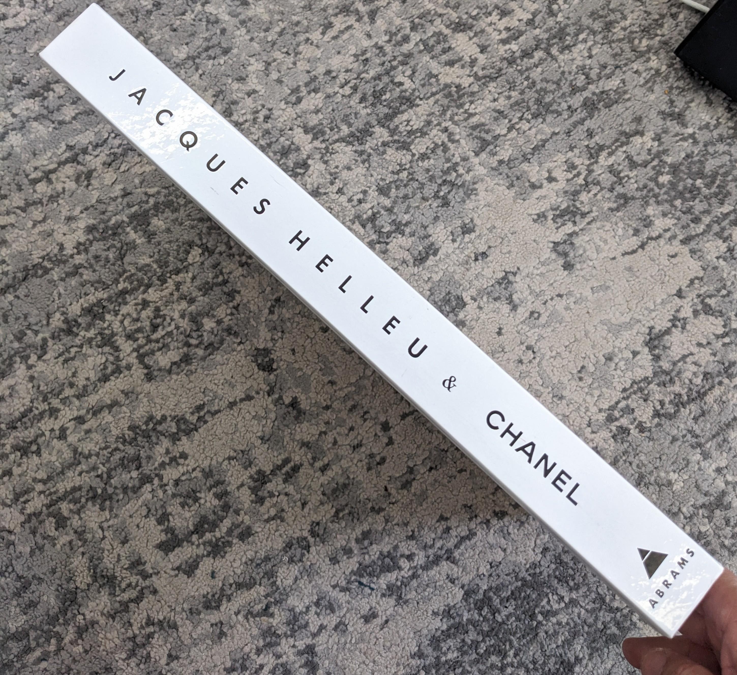 Chanel Coffee Table Book about Jacques Helleu, the creative image director for the house for many decades. Many images of famed campaigns and ideas including some of his work for other houses. 2006, Abrams. Hardcover with slipcover. 15