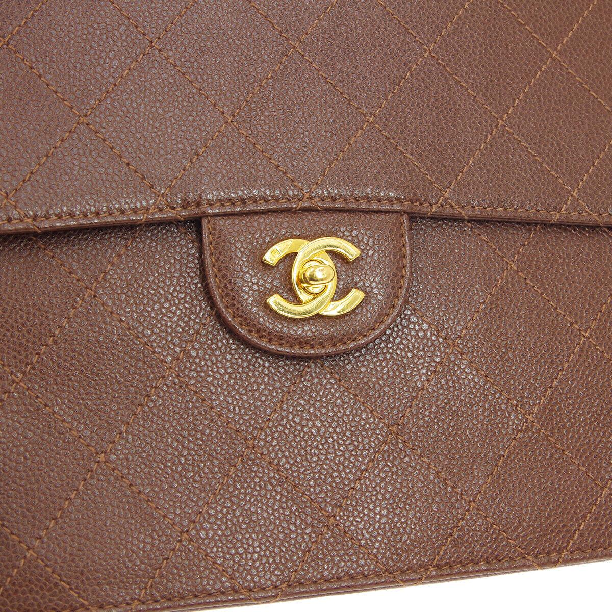 Chanel Cognac Chocolate Leather Gold Large Jumbo Evening Shoulder Flap Bag

Caviar leather
Gold tone hardware
Leather lining
Made in France
Shoulder strap drop 19.5