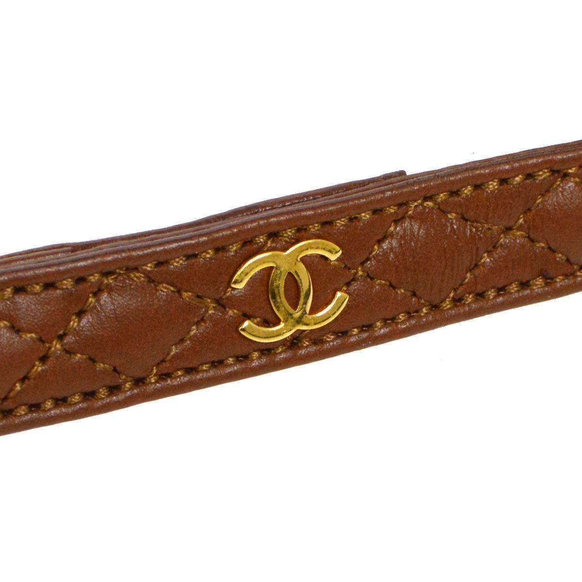 Chanel Cognac Leather Gold Charm Walking Pet Leash

Leather
Gold tone hardware
Hook closure
Made in France
Width 0.50