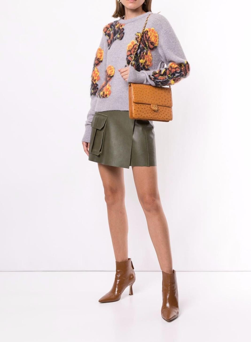 Chanel Cognac Ostrich Exotic Leather Gold Single Evening Shoulder Flap Bag

Ostrich
Gold tone hardware
Leather lining
Snap closure
Date code present
Made in France
Shoulder strap drop 15.5