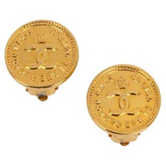 Chanel "Coin" Earrings in Gold Metal