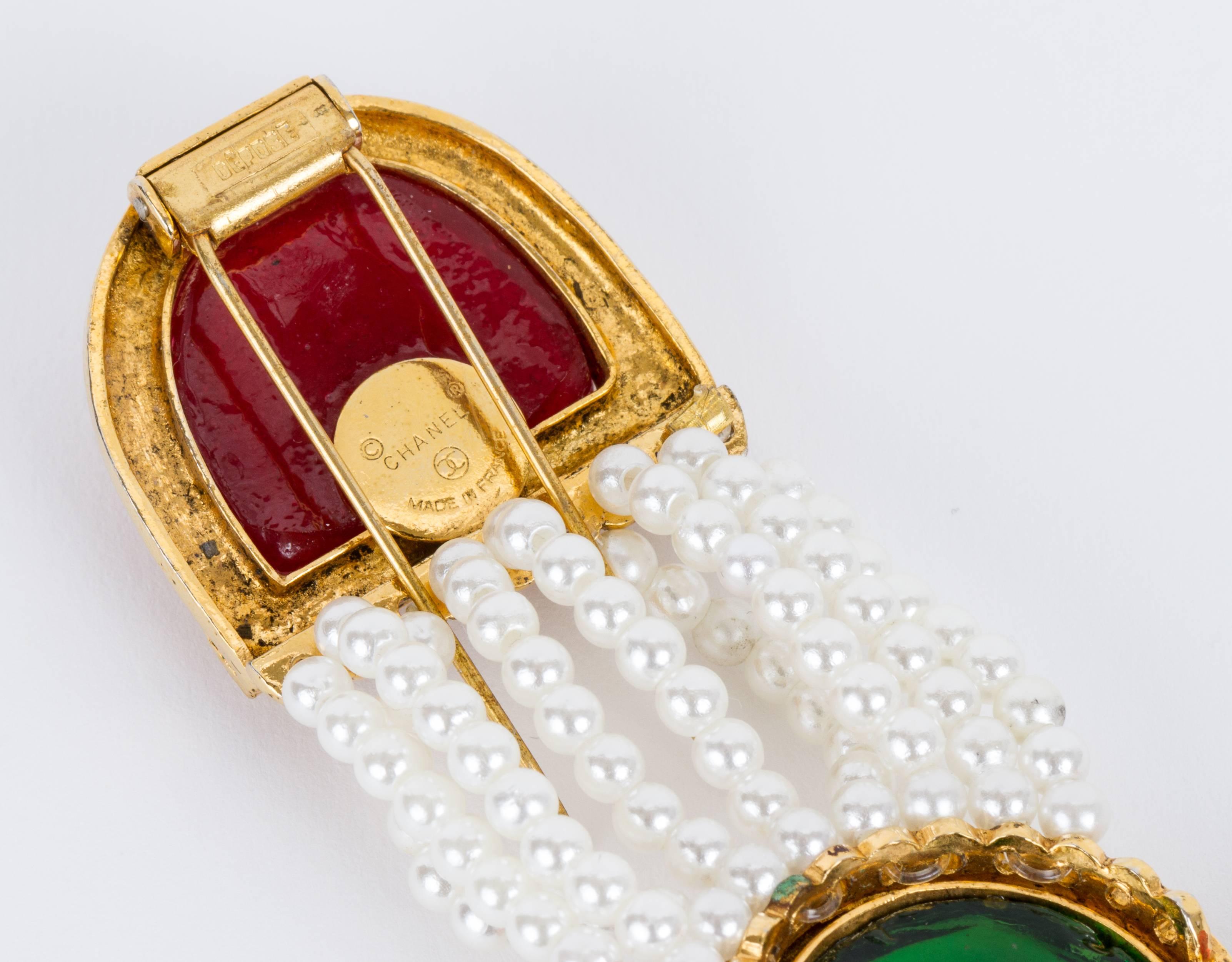 Chanel rare and collectible clip with red and green gripoix drops and multi strand pearls. Comes with original box.
