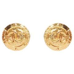 CHANEL Collection 28 Vintage gold tone CC logo coin medallion clip on earring