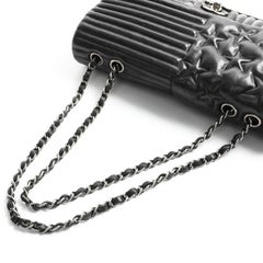 CHANEL Collector Tasche Paris Dallas aus schwarzem Lammfell