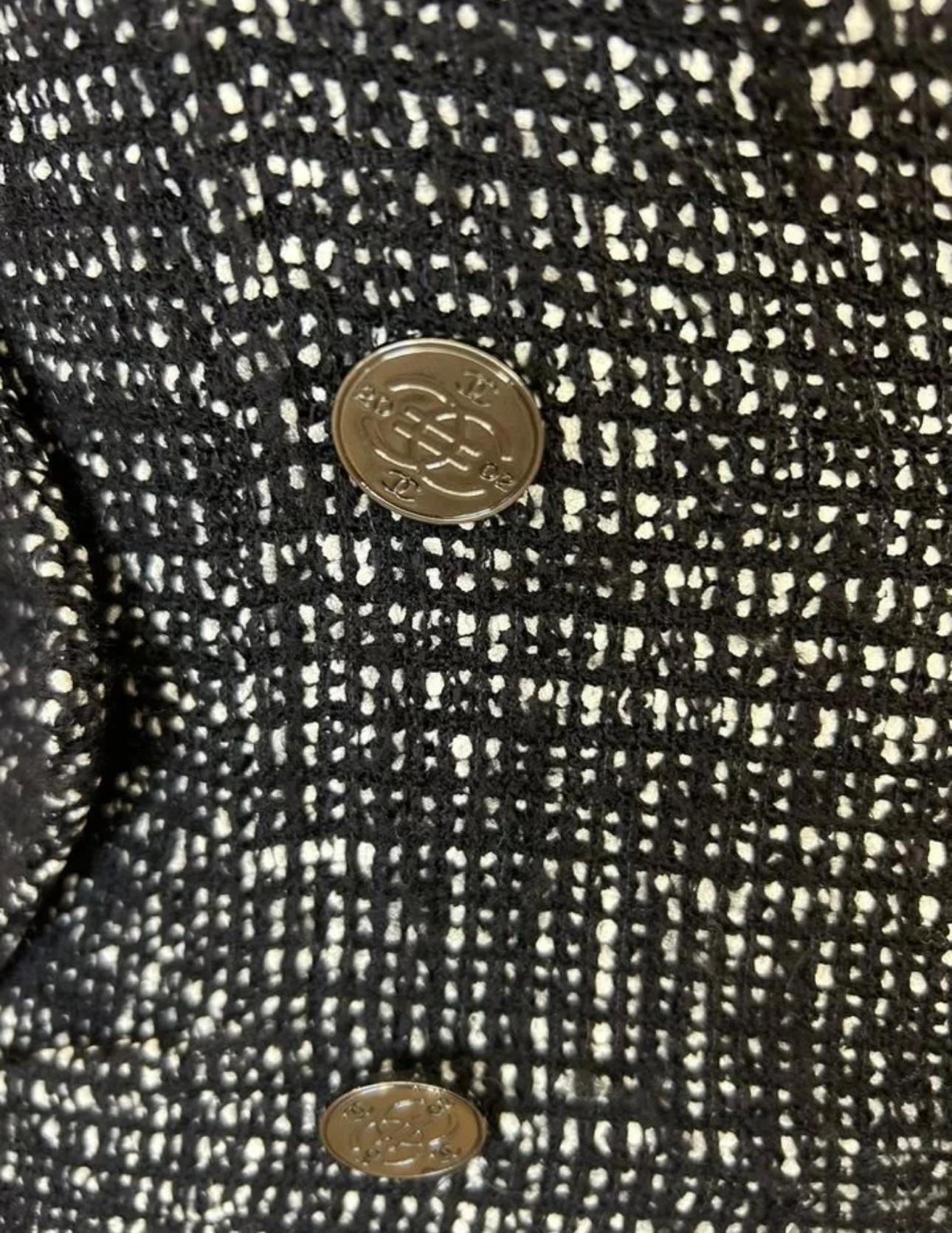 Chanel back tweed maxi coat from 2002 Fall Collection. A rare find!
- CC logo 'EURO / €' sign buttons
- tonal silk lining
Size mark 40 FR. Pristine condition.