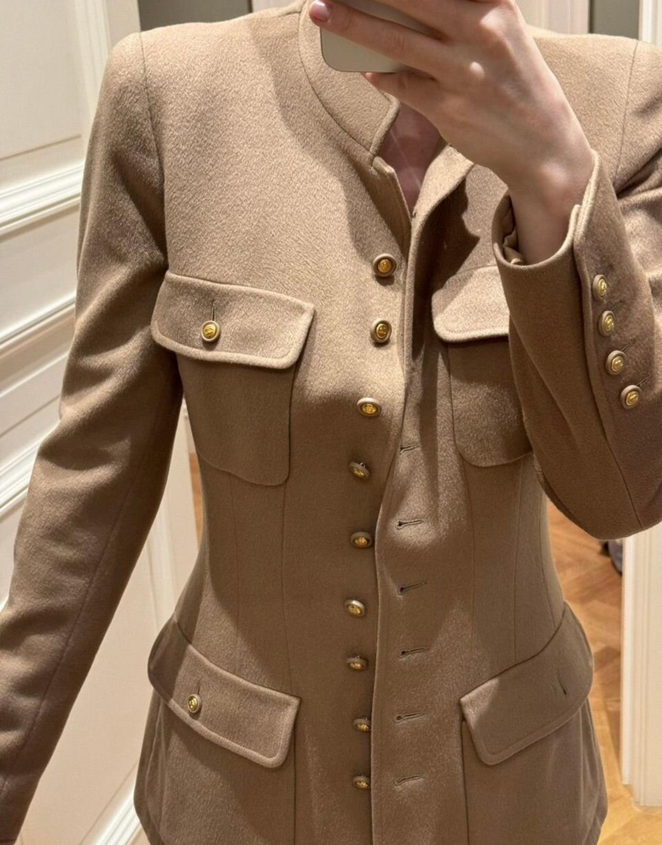 Stunning nude beige cashmere jacket from Karl Lagerfeld Fall collection of 1990s.
- CC logo buttons with 24-karat gold coating
- CC logo silk lining
Size mark was 36 FR, size label detached. Condition os pristine.