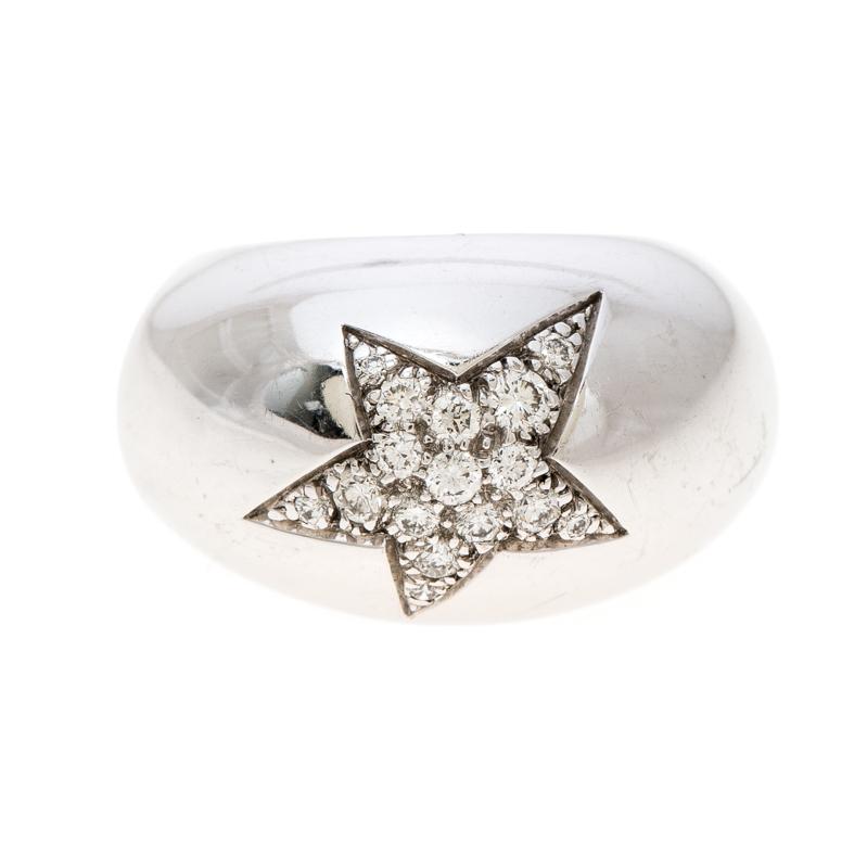 The use of shooting stars and constellations by Chanel can be traced back to years as far as 1932. The 5 point shape is translated well in this gorgeous ring. It is made from 18k white gold and it has a mounted front with a star set with diamonds