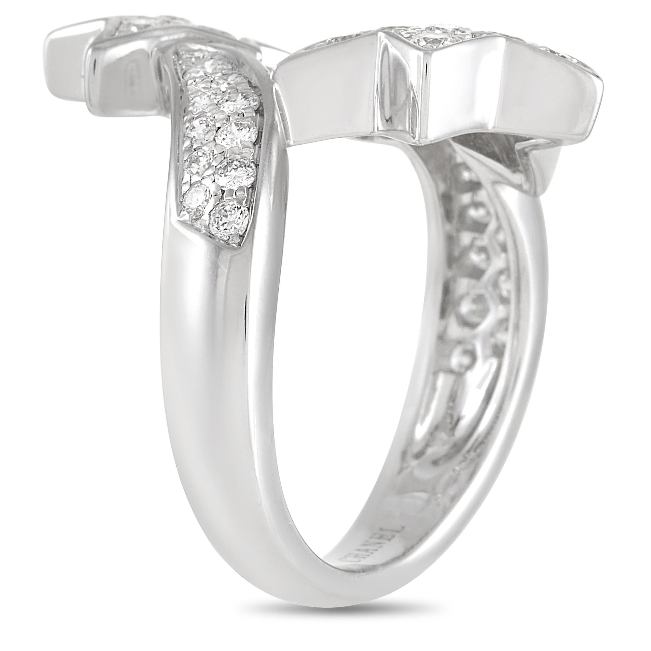 This pretty Chanel Comète Géode 18K White Gold Diamond Ring is made with 18K white gold forming a wrap around band meeting in a shooting star on either side. The ring is set with small round diamonds throughout, giving it all the sparkle and shine