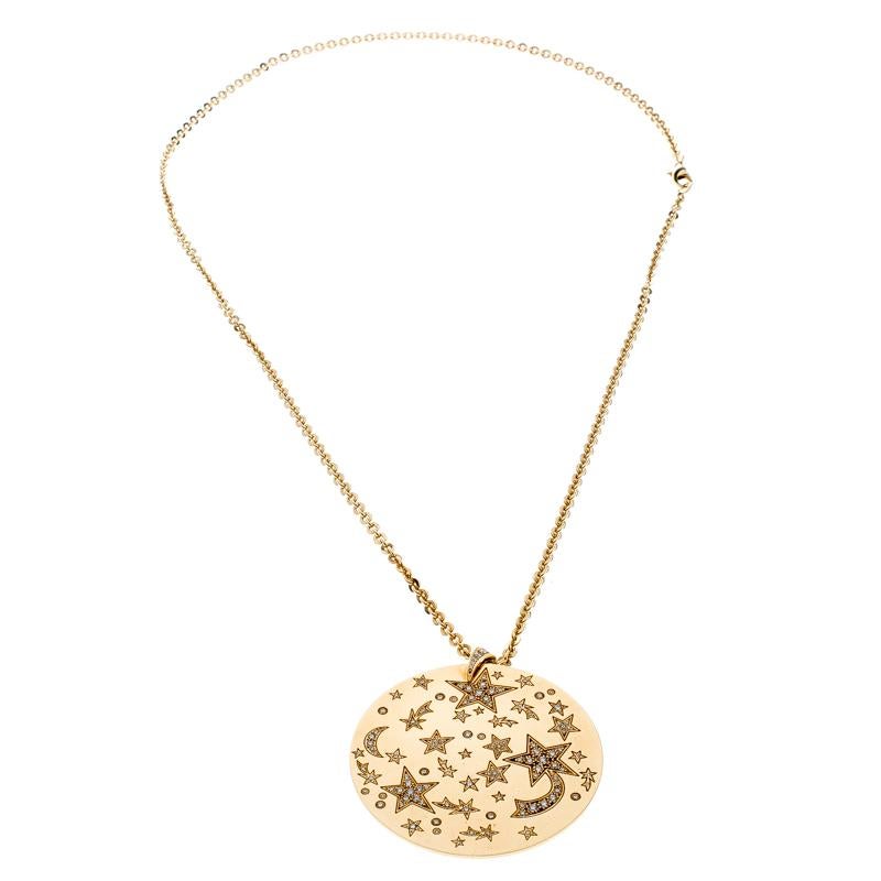 The use of shooting stars and constellations by Chanel can be traced back to years as far as 1932. The 5 point shape is translated well in this gorgeous necklace. It is created from 18k yellow gold, and the chain holds a circular pendant set with