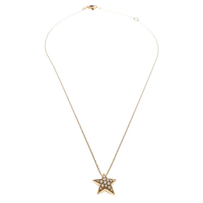 The use of shooting stars and constellations by Chanel can be traced back to years as far as 1932. The 5 point shape is translated well in this gorgeous necklace. It is made from 18k yellow gold and the chain holds a star pendant set with 14