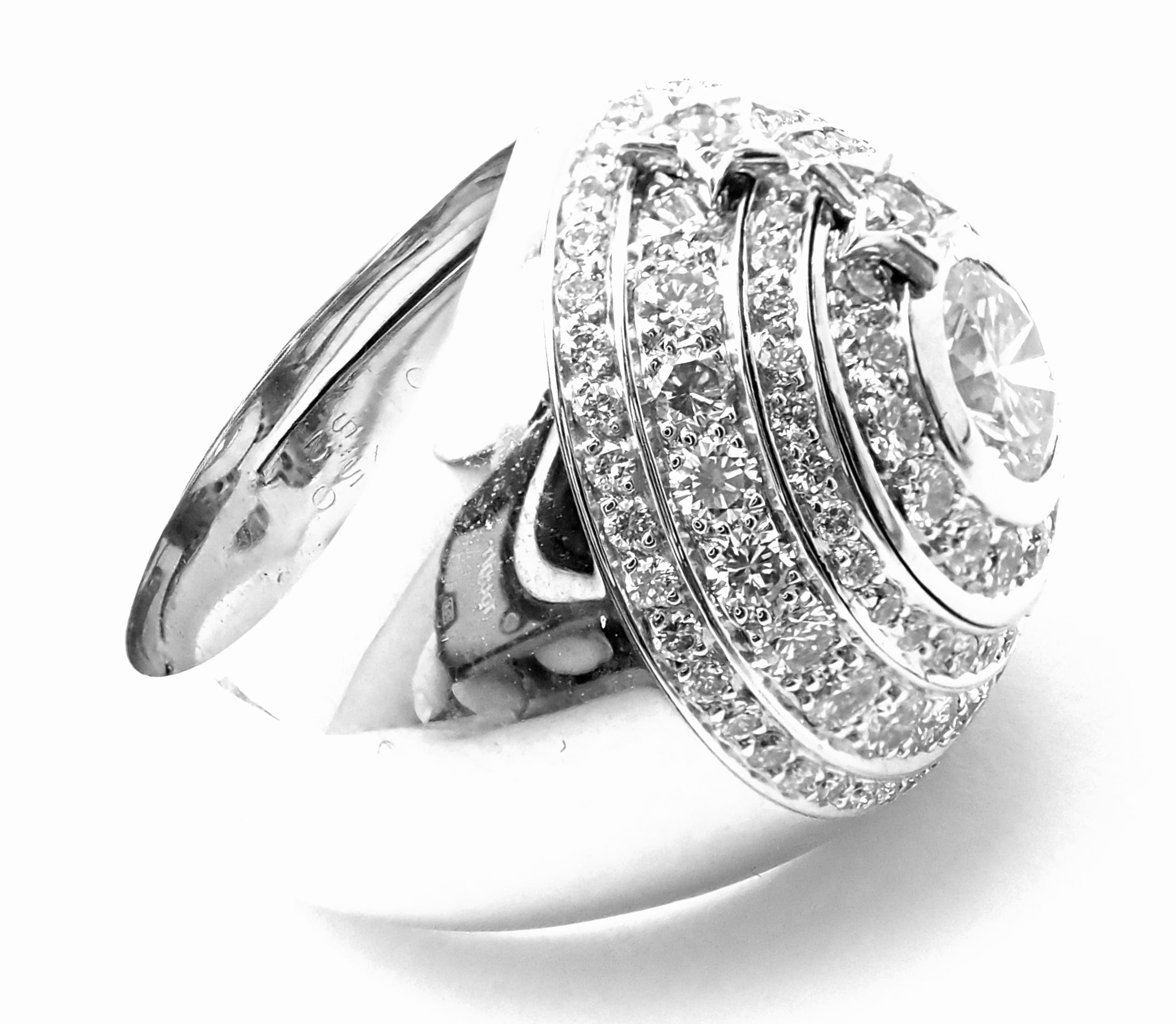 18k White Gold Comete Star Diamond Large Spinning Ring by Chanel.
With Center 1 round brilliant cut diamond E color, VVS1 clarity total weight approximately .77ct
118 round brilliant cut diamonds E color, VVS1 clarity total weight approximately