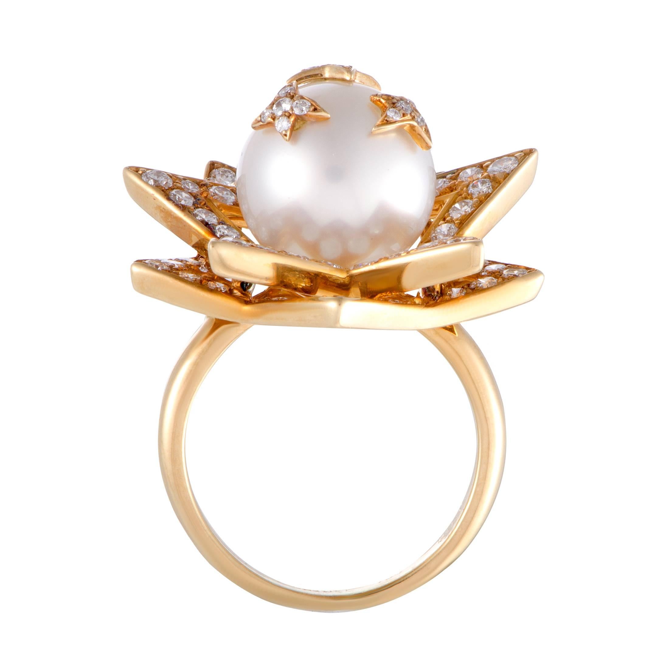 This remarkable 18K yellow gold ring by Chanel from its gorgeous 'Comette' collection is exceptionally sublime! The beautifully unique design is adorned in 1.20ct of sparkling diamonds and a magnificent white pearl that perfectly epitomizes elegance
