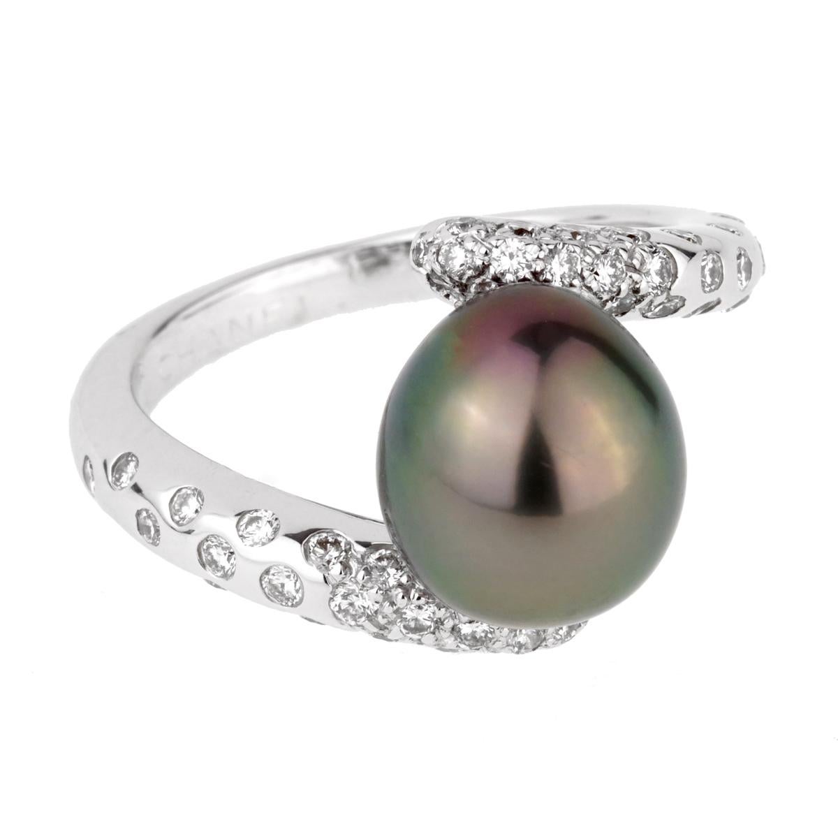 A fabulous Chanel ring from the Concept collection circa 2001 featuring a 10.5mm pearl surround by the finest Chanel round brilliant cut diamonds set in 18k white gold.