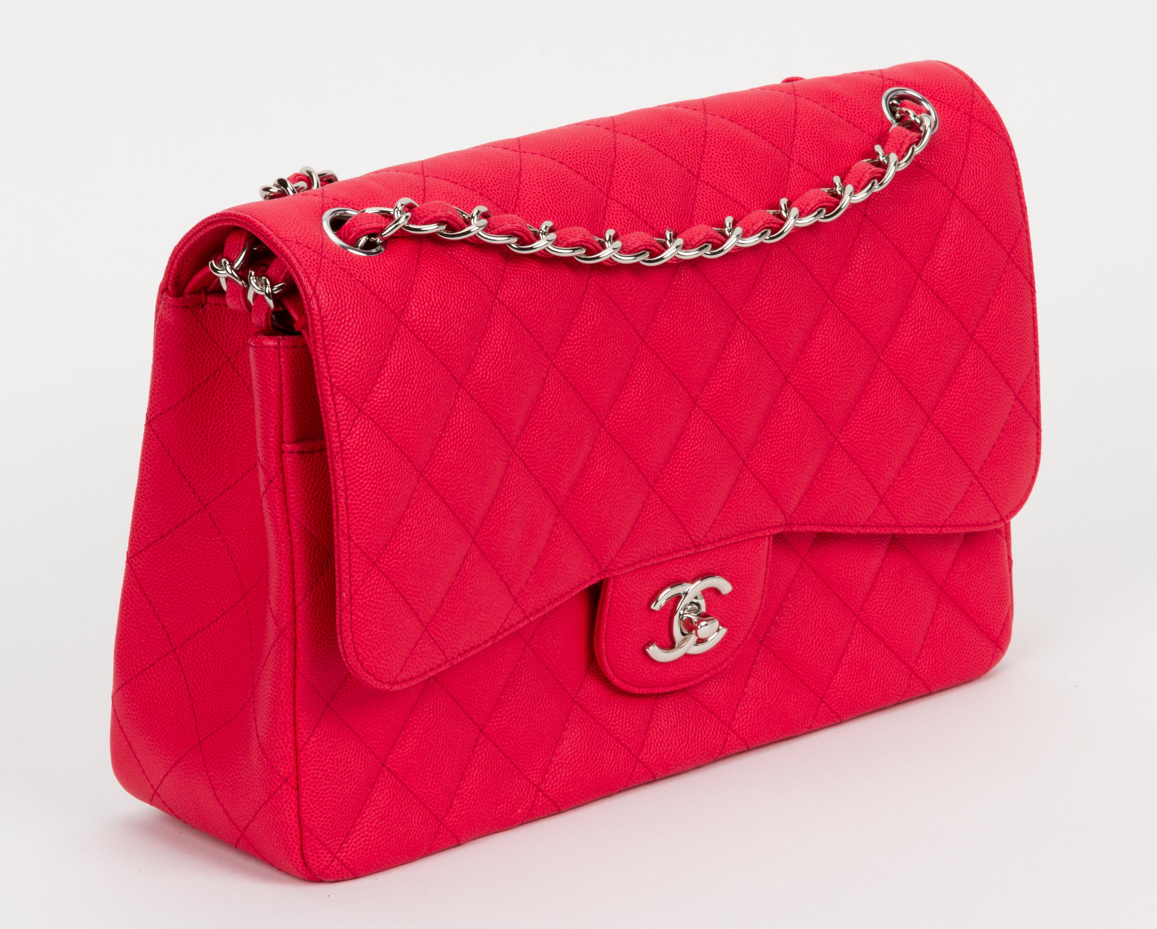 Chanel new condition jumbo classic double flap. Coral caviar leather quilted with silver tone metal hardware. Single drop 24