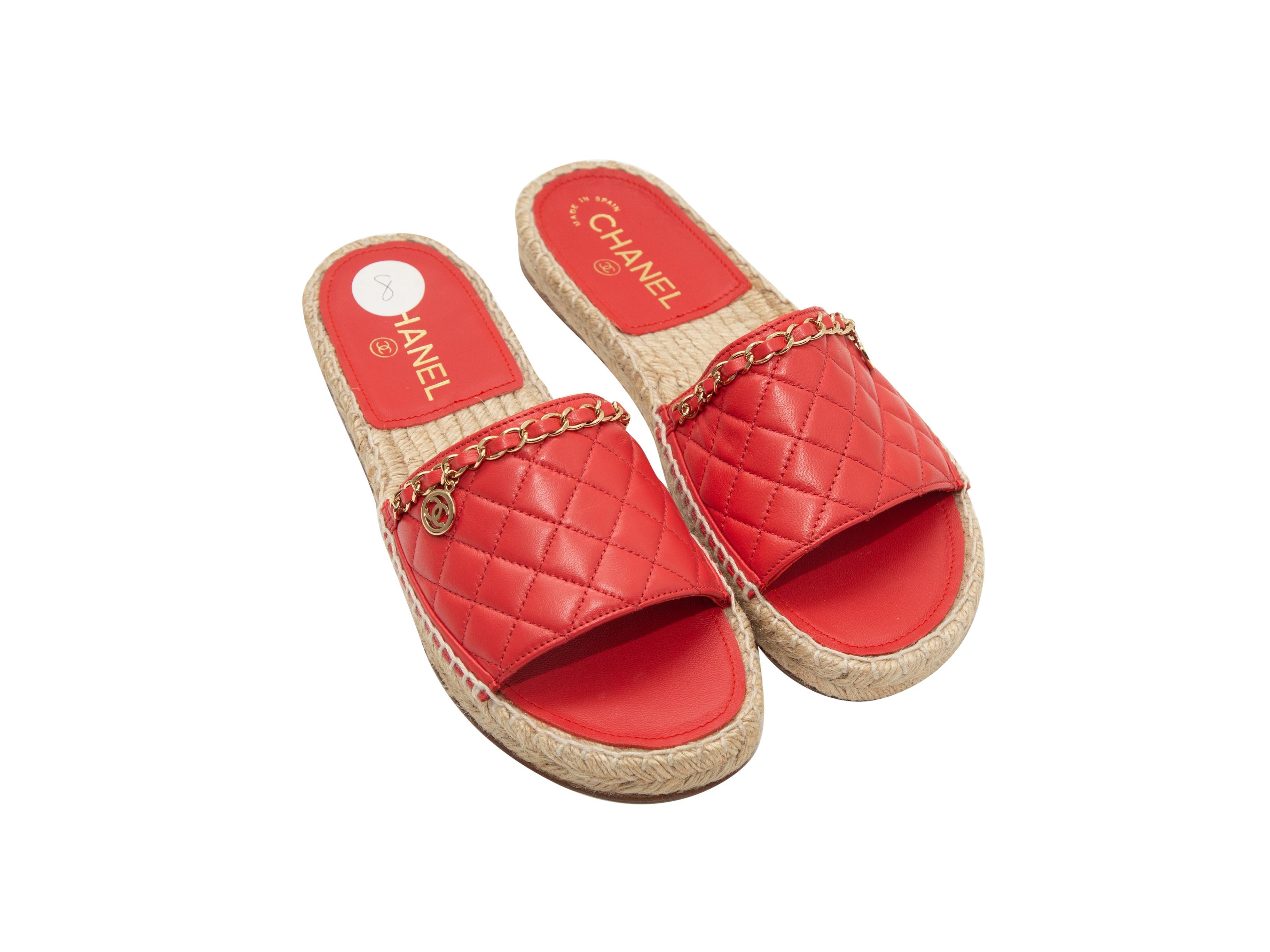 Product details: Coral quilted leather espadrille slide sandals by Chanel. From the 2018 Collection. Gold-tone chain-link trim at tops. Jute trim at rubber soles. Designer size 38. 1
