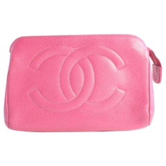 hot pink chanel clutch on