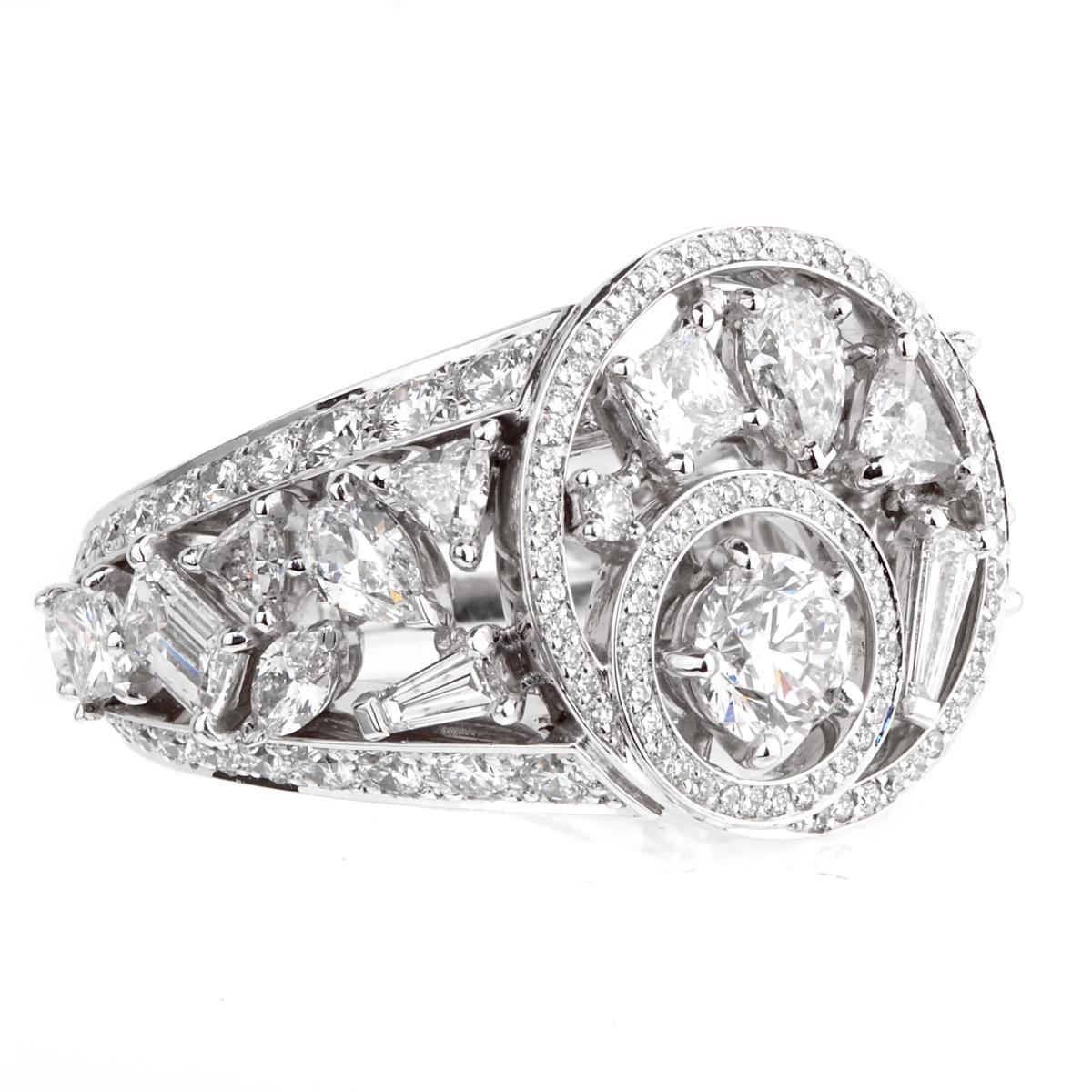 A wonderful piece of art by Chanel from the Cosmos collection featuring a multitude of round diamonds with delicately placed emerald cut, baguette, pear shape, princess cut and trillion cut diamonds set in 18k white gold. The round brilliant cut