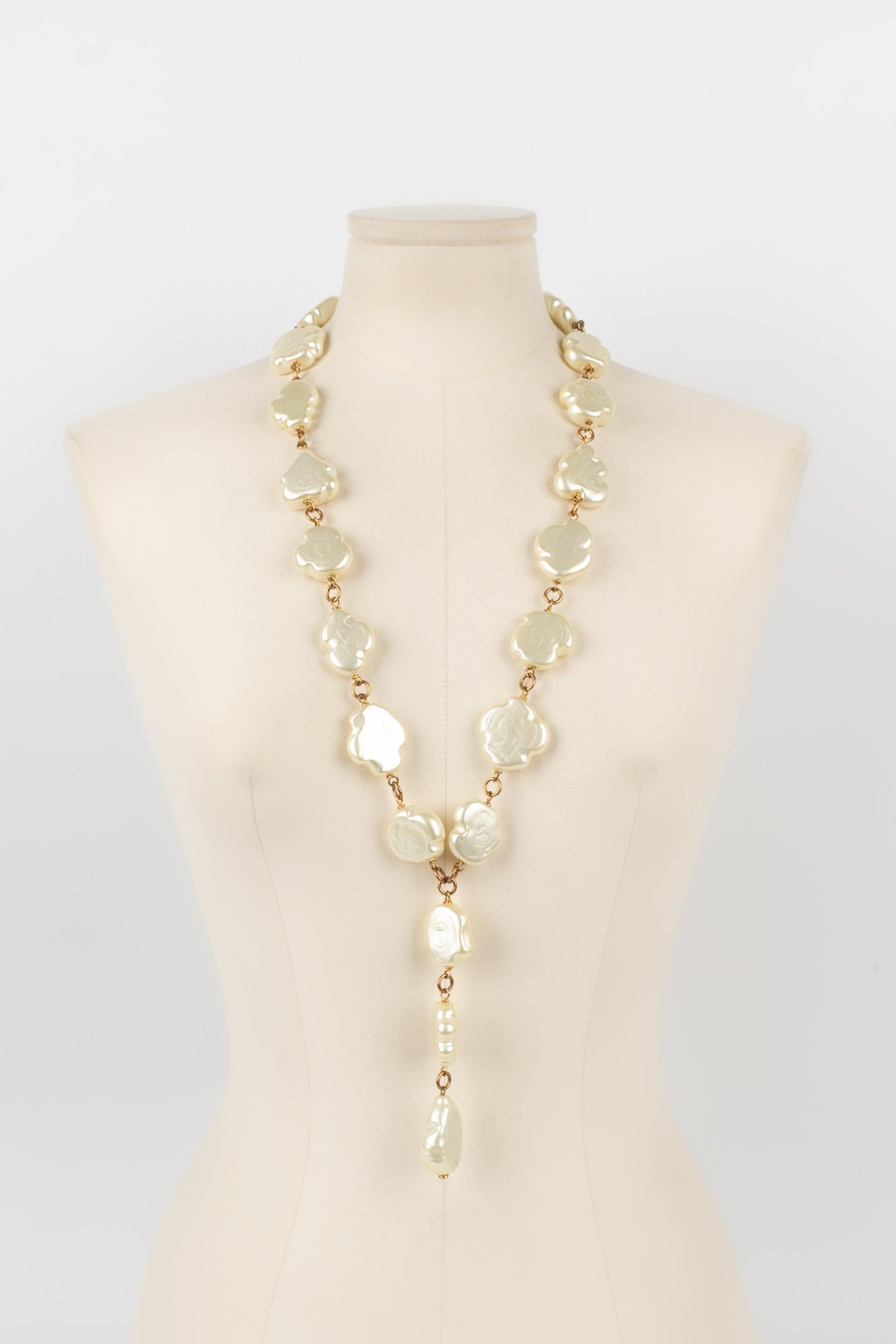 Chanel - (Made in France) Costume pearl necklace with a baroque design. Jewelry from the middle of the 1980s.

Additional information:
Condition: Very good condition
Dimensions: Length: from 80 cm to 86 cm

Seller Reference: CB236