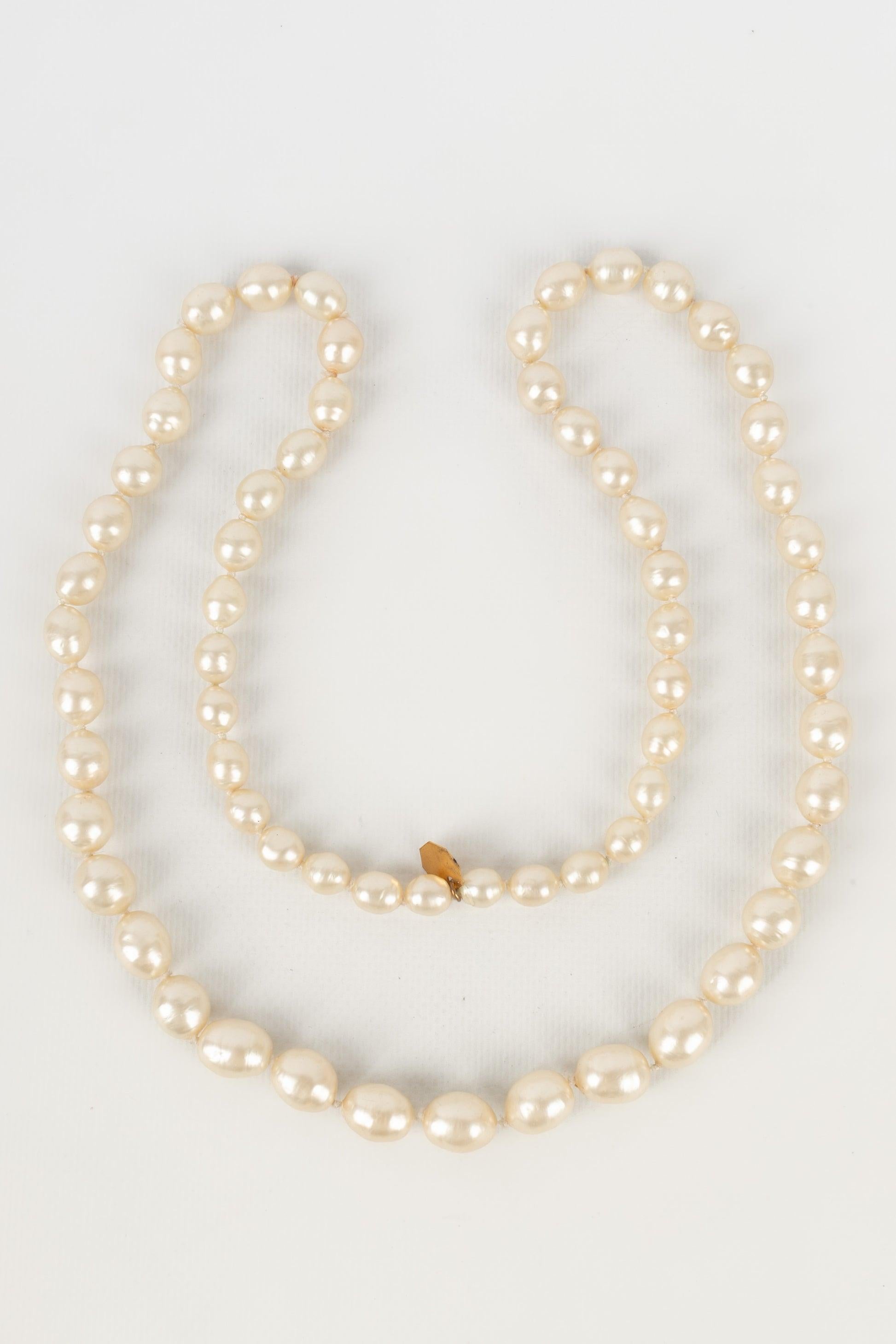 Chanel Costume Pearl Necklace with a Golden Metal Pendant For Sale 5