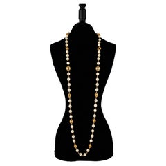 Vintage Chanel Costume Pearl Necklace with CC Logos