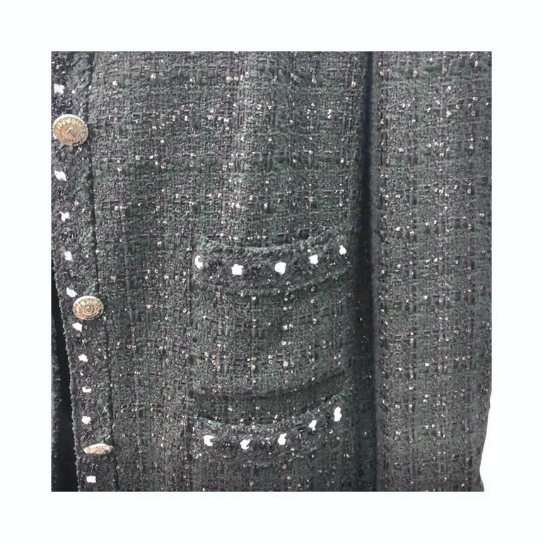 - Vintage Chanel cotton/rayon black and dark green with multi colours tweed jacket from year Fall 2005 collection. 

- Four front pockets. 

- Silver and gold toned hardware buttons. 

- Three front buttons closure. 

- Three cuff buttons.

- Size