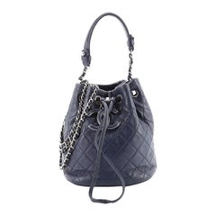 Chanel Covered CC Drawstring Bucket Bag Quilted Calfskin Mini