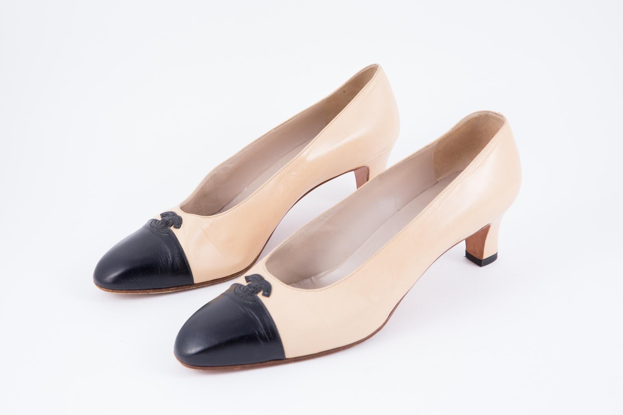 chanel cream and black shoes