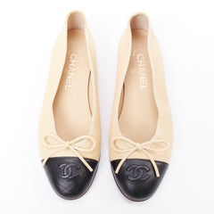 CHANEL cream black leather CC logo two tone monochrome toe cap flats EU37