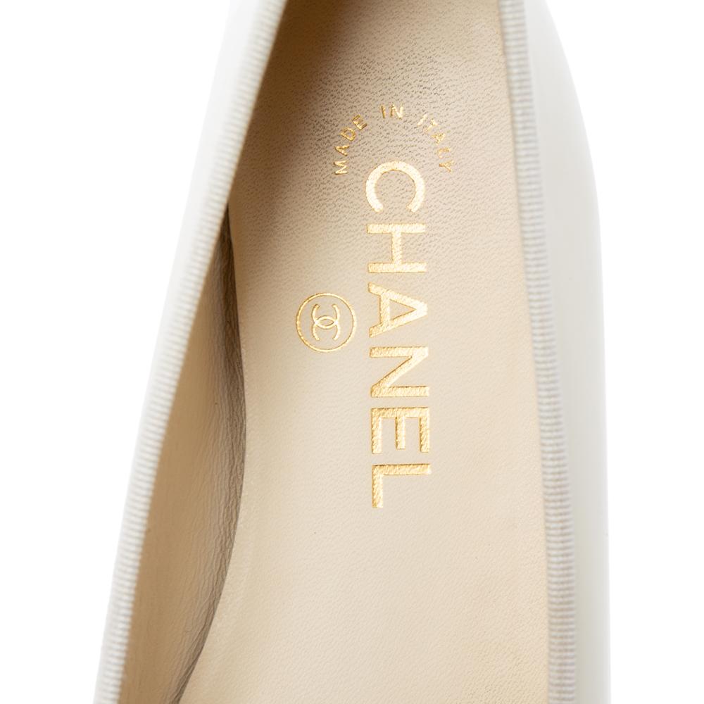 chanel cream and black ballet flats