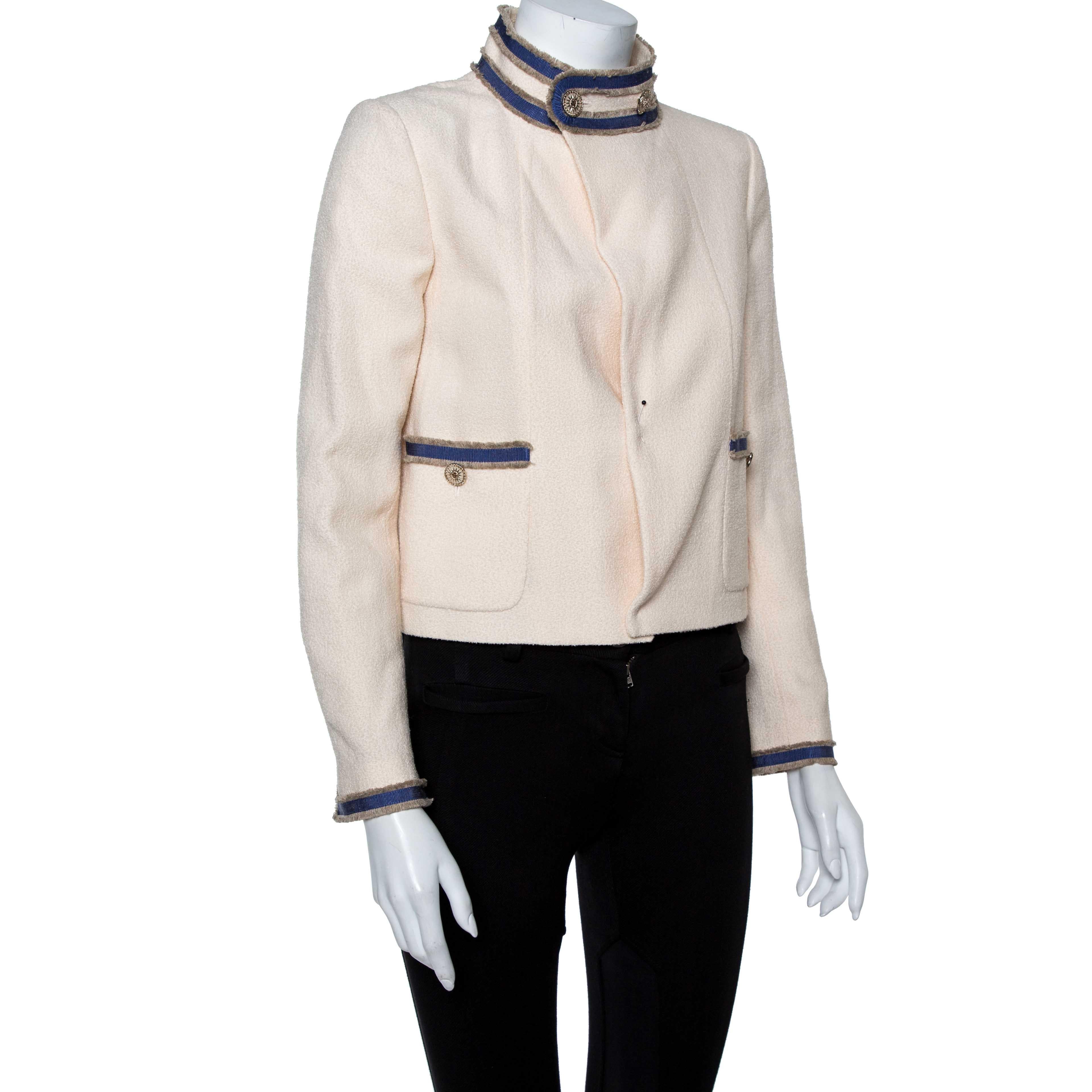 Known for creating stunning jackets since its inception, the Gucci jacket here is also another impeccable design from the brand. Made from quality materials, this boucle jacket comes in a lovely cream hue and flaunts contrasting trims. It is